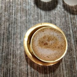 Close-up of coffee cup on table