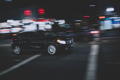 Cars moving on road at night