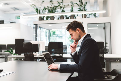 Business colleagues working on table