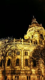 Low angle view of illuminated building at night