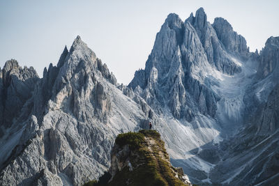 Panoramic view of rocky mountains against sky