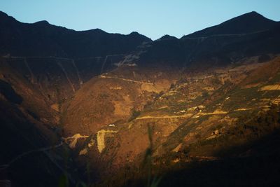 Scenic view of mountains against clear sky