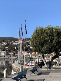 Panoramic shot of buildings against clear blue sky