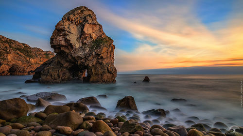 Scenic view of sea against sky during sunset