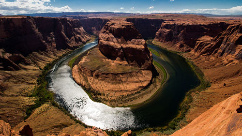 Scenic view of rock formations against sky