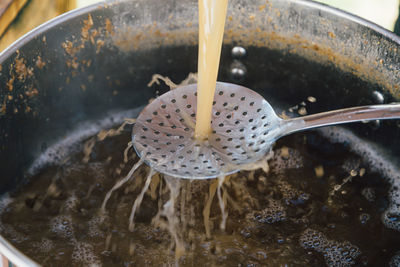 High angle view of coffee beans in water