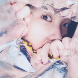 Close-up portrait of girl holding ice cream