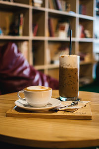 Coffee cup on table at cafe