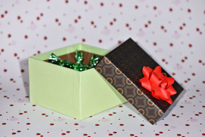 Close-up of gift box on patterned table