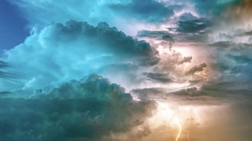 Low angle view of clouds in sky during sunset