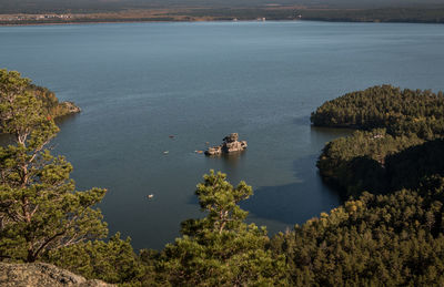 High angle view of sea and trees