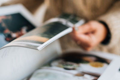 Close-up of woman hand holding book