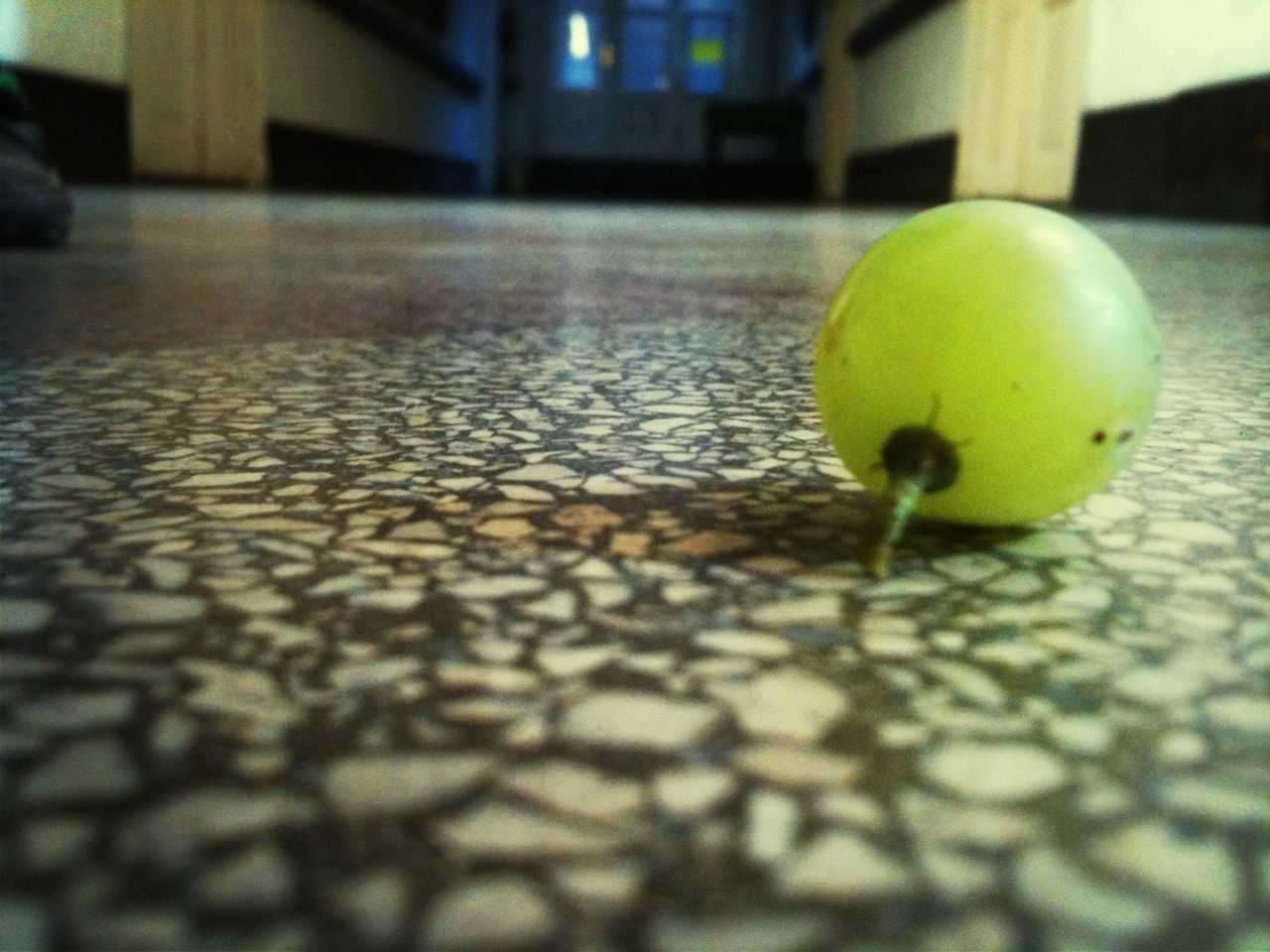 fruit, close-up, focus on foreground, selective focus, built structure, architecture, no people, still life, food, day, outdoors, street, food and drink, wood - material, building exterior, yellow, wall - building feature, green color, sunlight