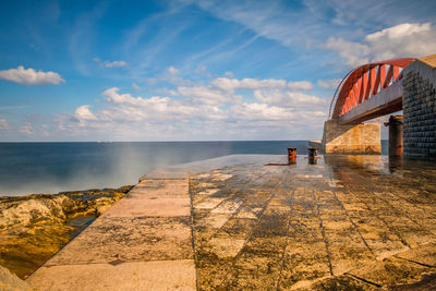 Waves and breakwater at the st. elmo bridge