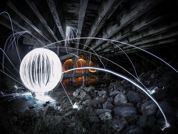 Light trails in water at night