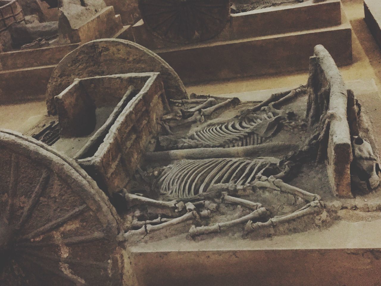 indoors, high angle view, no people, still life, metal, close-up, wood - material, basket, wall - building feature, old, day, art and craft, abandoned, rope, obsolete, damaged, sunlight, rusty, large group of objects