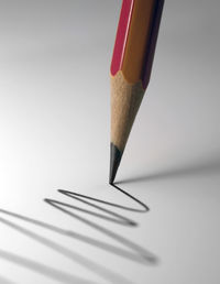 High angle view of pencils on white background