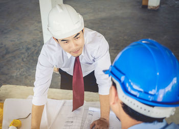 Midsection of woman working at construction site