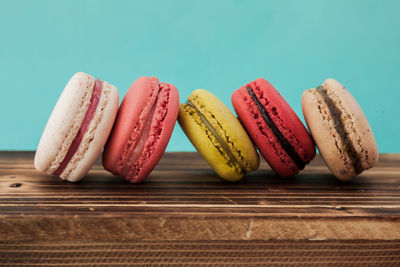 Close-up of multi colored candies on table