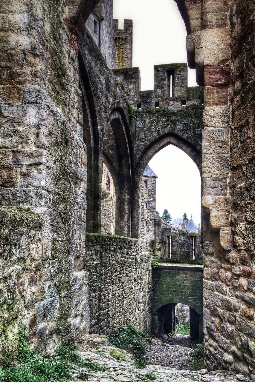 architecture, built structure, arch, history, building exterior, old ruin, stone wall, old, the past, abandoned, damaged, ruined, wall - building feature, stone material, clear sky, ancient, weathered, obsolete, building, day