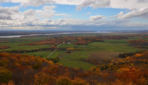 Scenic view of landscape against sky during autumn