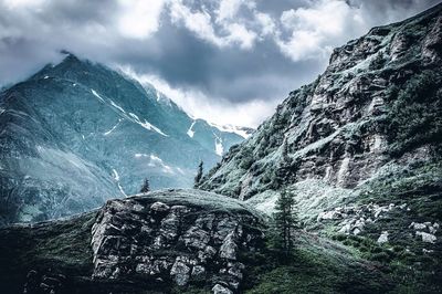 Panoramic view of snowcapped mountains against sky