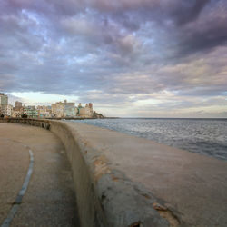 Scenic view of sea against sky at sunset