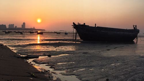 Scenic view of sea at sunset