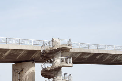 Low angle view of bridge against clear sky