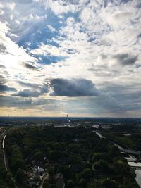 High angle view of cityscape against cloudy sky