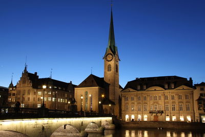 Illuminated cathedral against sky at night