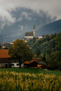 Church in bavarian alps looking over village.