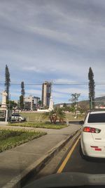 View of road against cloudy sky