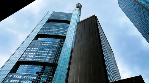 Low angle view of modern buildings against sky