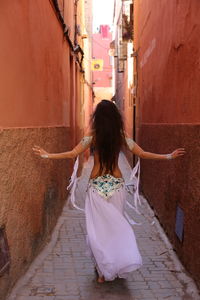 Portrait of beautiful young bellydancer wearing her belly dancing outfit and standing outdoors