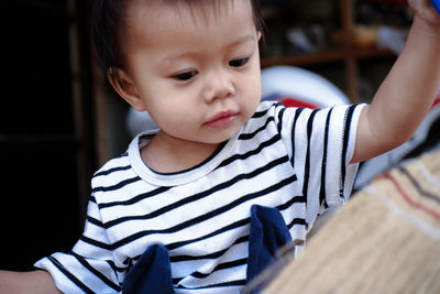 Cute boy looking at camera