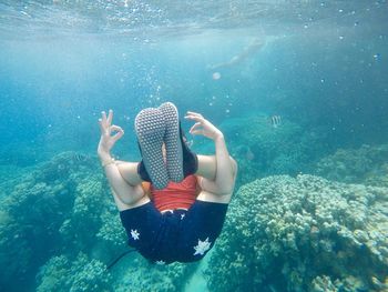 Full length of girl swimming in sea