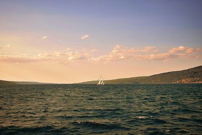 Scenic view of sea at sunset