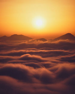 Scenic view of dramatic sky during sunset