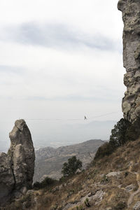 One person poses balancing in a highline at los frailes