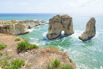 Raouche pigeon rock, touristic icon of beirut, lebanon, sea cave and mediterranean sea, middle east