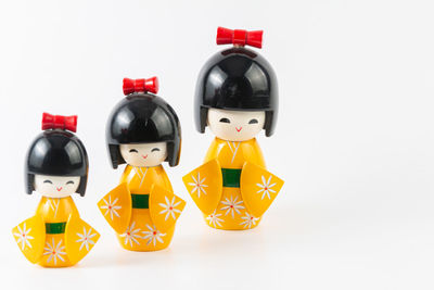 Close-up of stuffed toy over white background