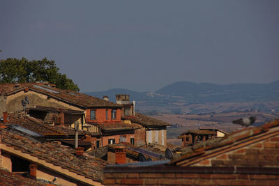 High angle view of buildings in city against sky