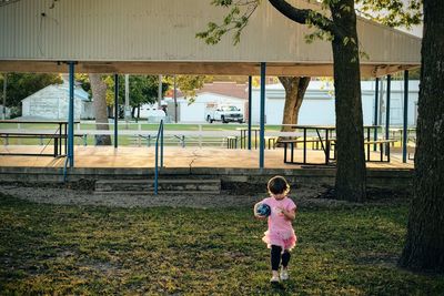 Cute girl walking at park