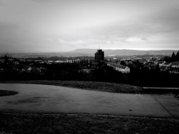 View of buildings against cloudy sky