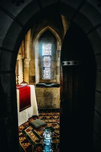 View of historic building seen through window