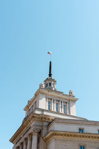 Low angle view of building against blue sky