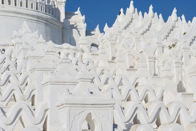 Low angle view of white building against sky