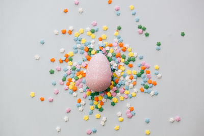 Close-up of multi colored candies on table