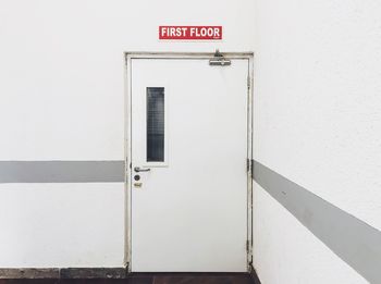 Information sign on wall of building